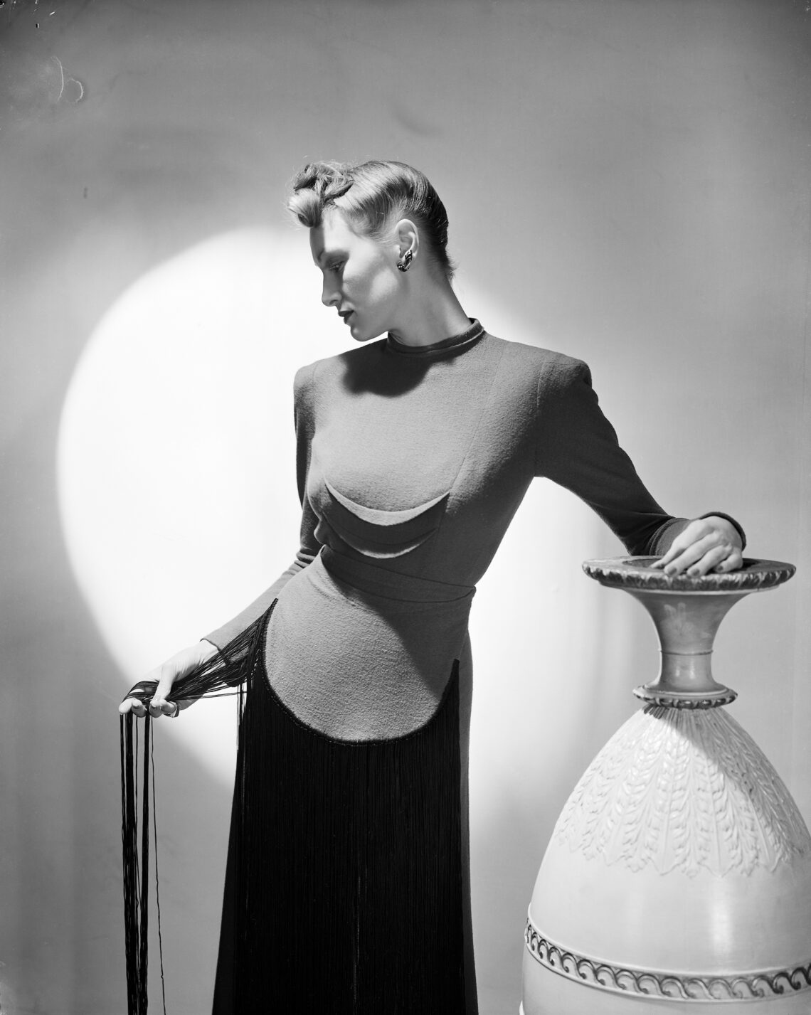 Lee Miller: The Lead evening dress, London, 1941 © Lee Miller Archives, East Sussex, England. www.leemiller.co.uk